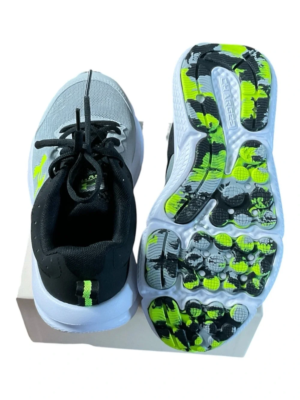 Under Armour Kids Charged Assert 10 Grey Black Volt Running Shoes Size  5Y